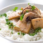 Cooked cuttlefish in a pot. Greek recipe. Featured image