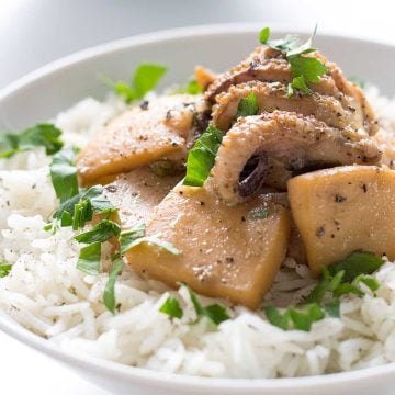 Cooked cuttlefish in a pot. Greek recipe. Featured image