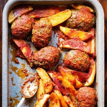 Baked Bifteki with potatoes.