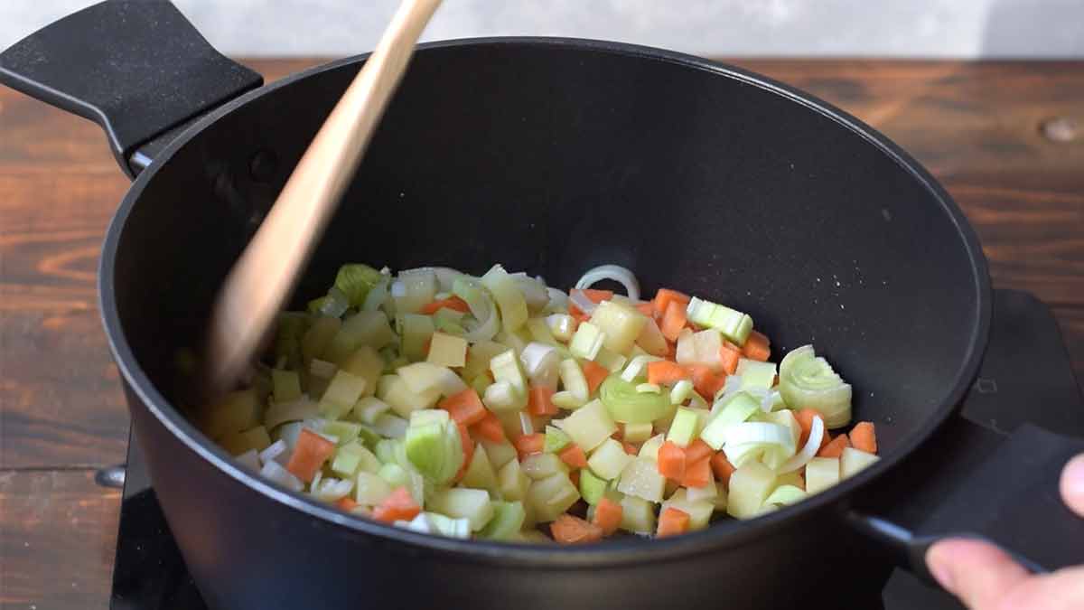 Vegetables cooking in a pot.