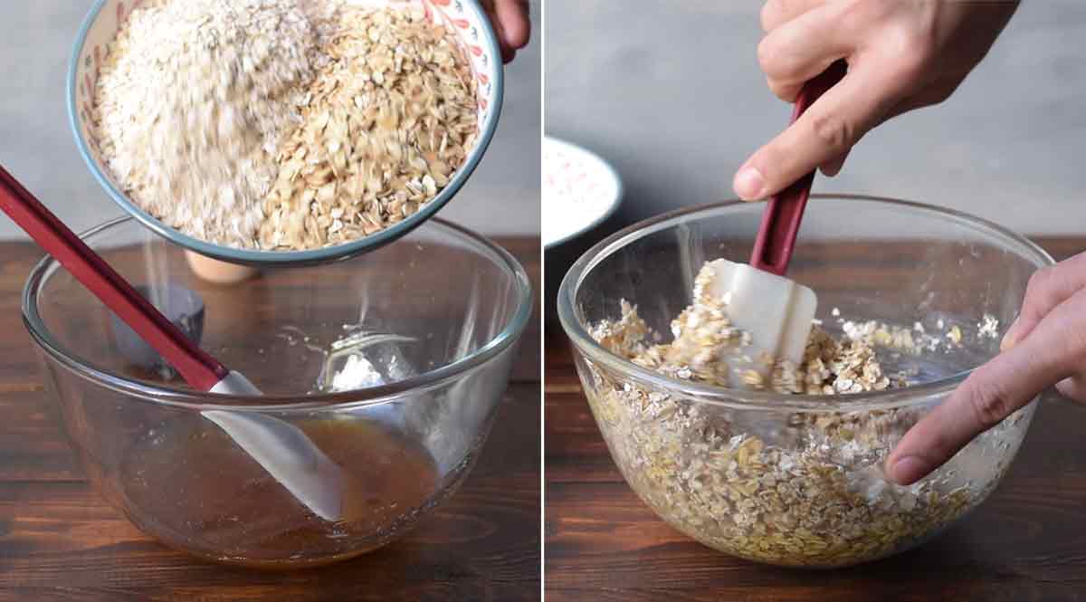 A hand adding oats to a bowl with the honey mixture.