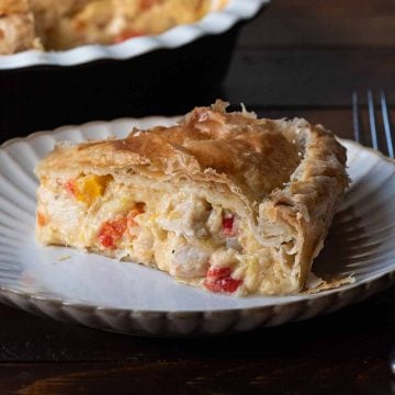 Chicken pot pie with puff pastry crust.