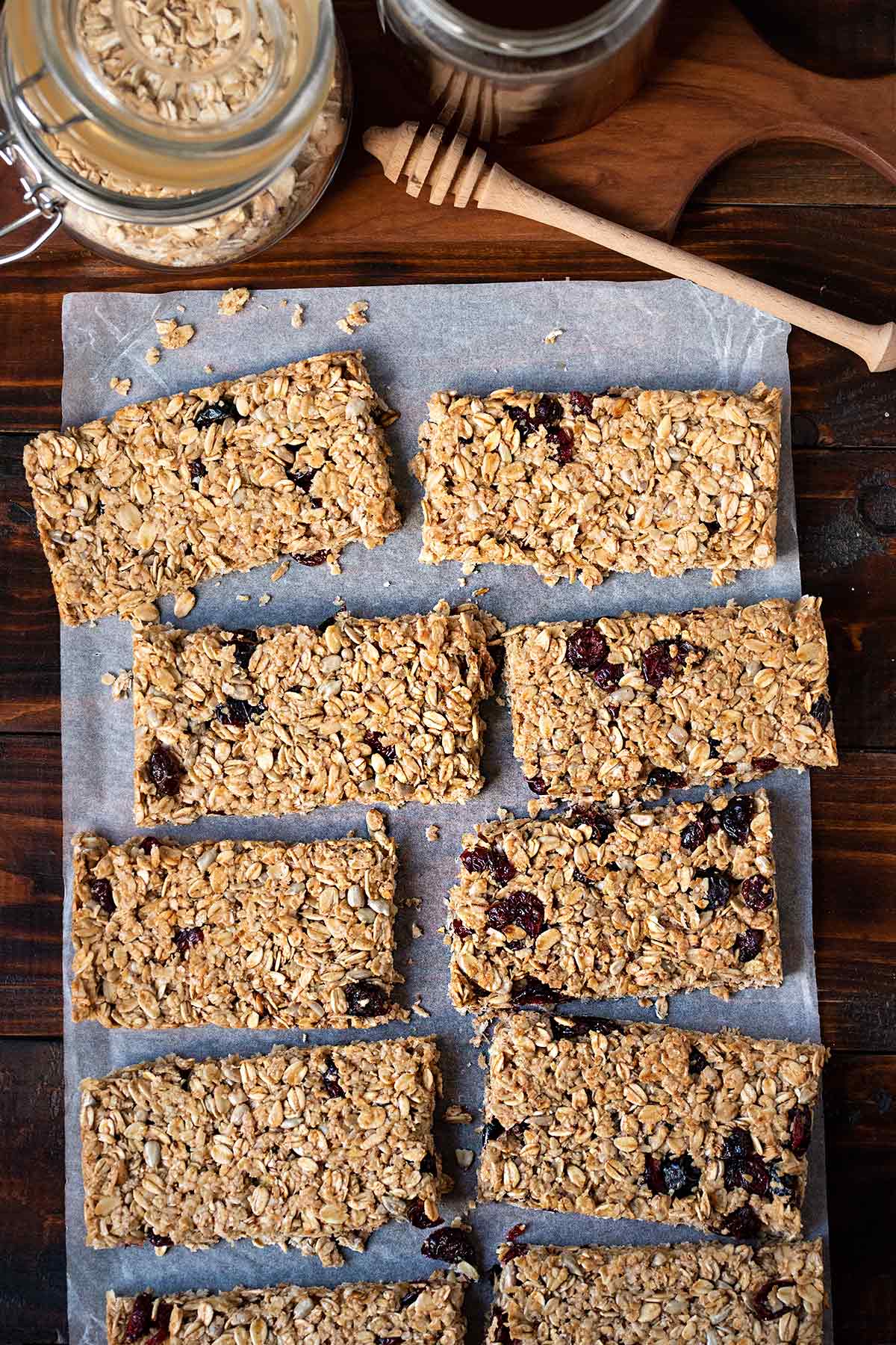 Oatmeal bars also called granola bars on a piece of parchment paper.