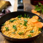 A small saucepan with white bean risotto.