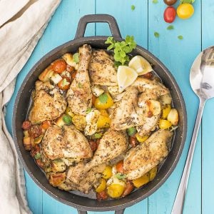 Baked Greek chicken with haloumi and heirloom tomatoes f