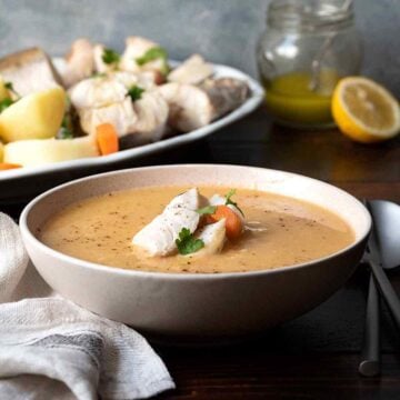 A bowl with Psarosoupa (Greek fish soup).