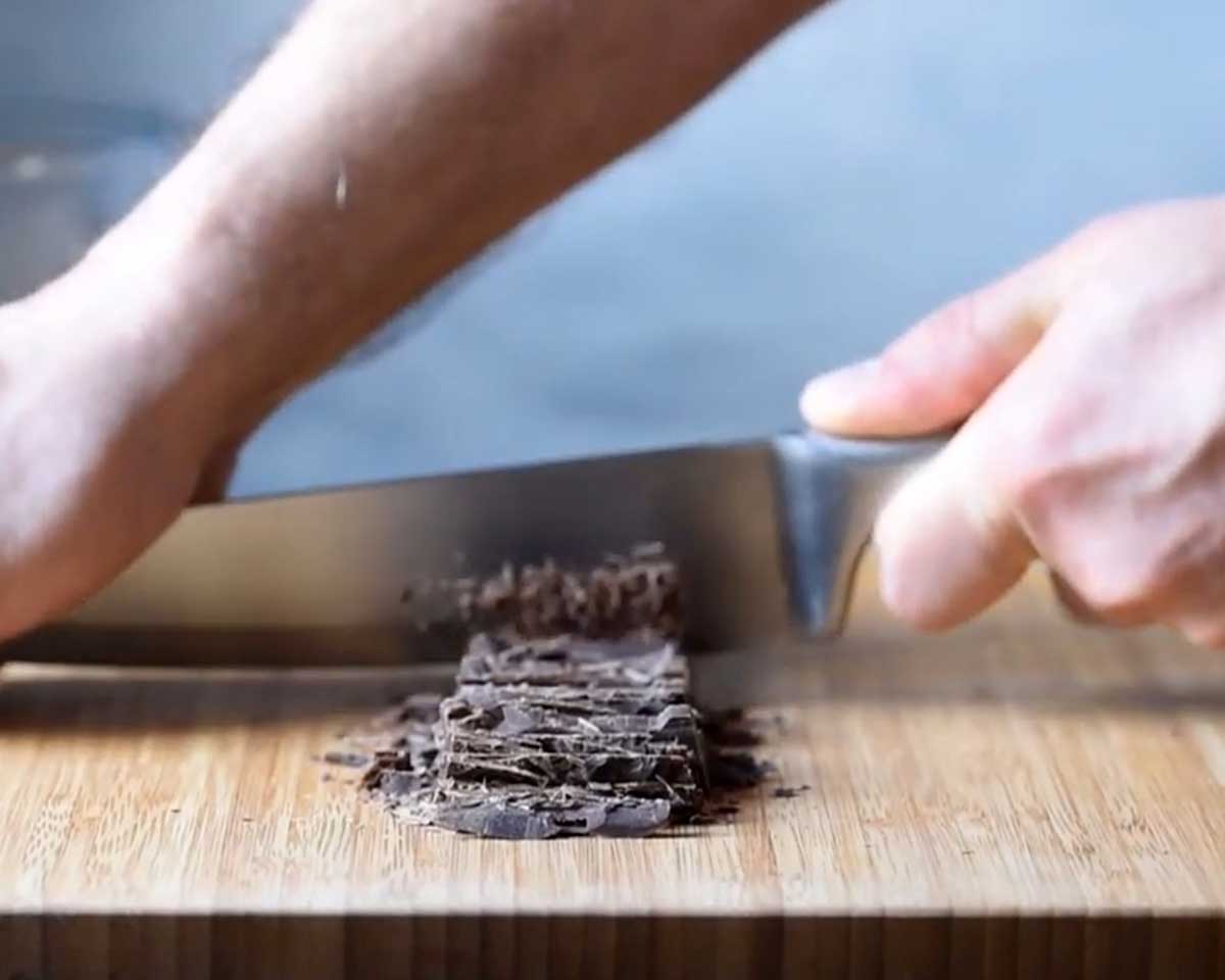 How to chop dark chocolate to make chocolate mousse.