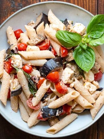 Pasta with sauteed eggplant, tomatoes, feta and basil.