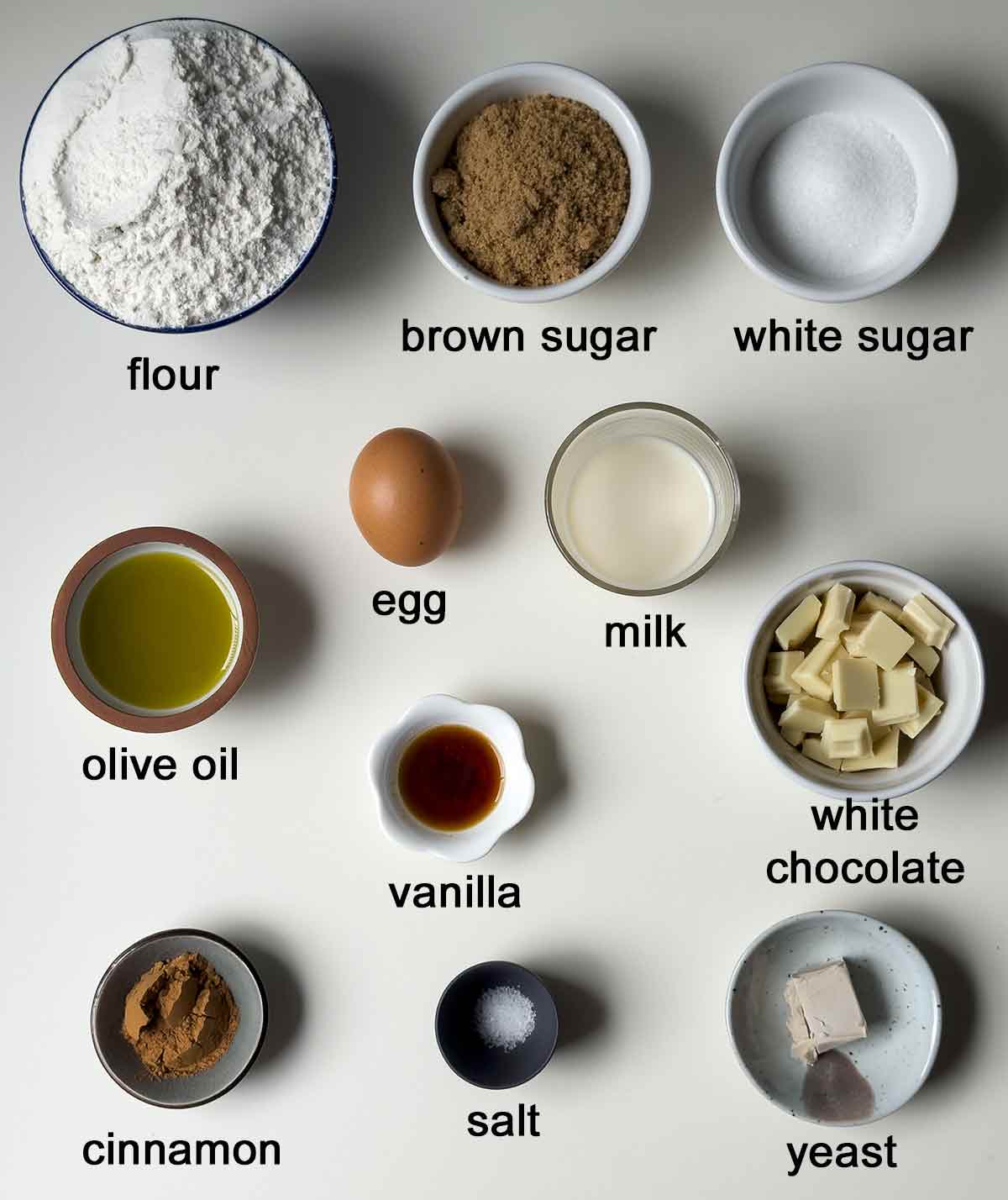 Ingredients for dairy-free homemade cinnamon rolls with olive oil.