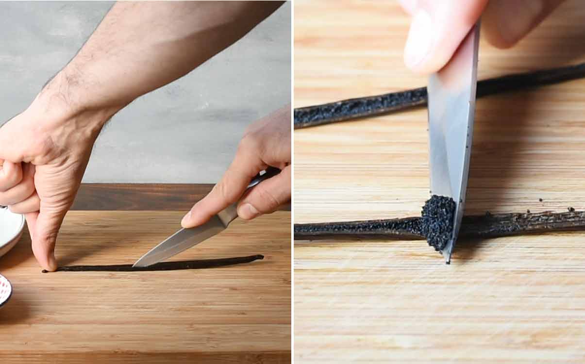 A knife slicing the vanilla pod and scraping out the black seeds.