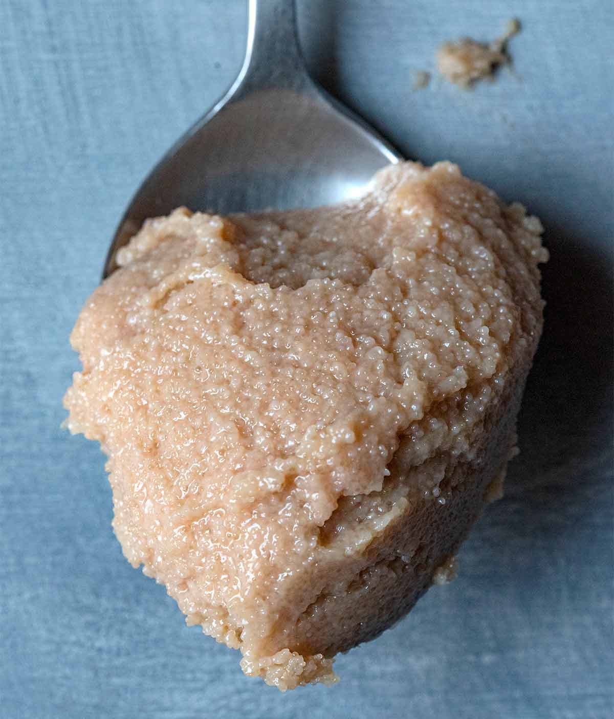 A spoonful with tarama (fish roe).