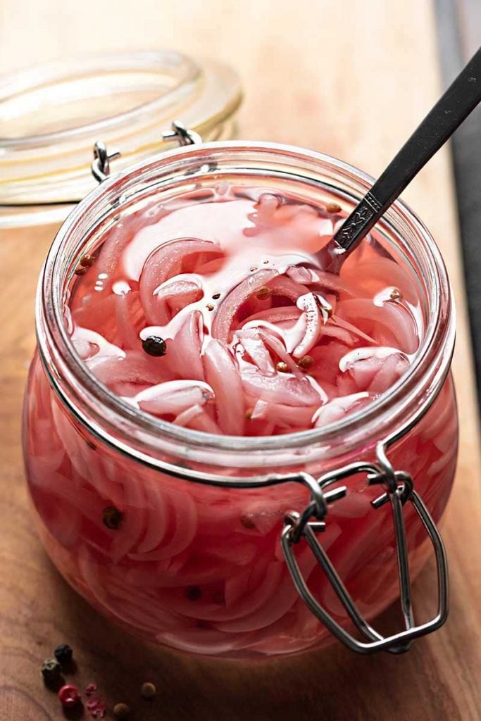 Quick pickled onions in a jar.