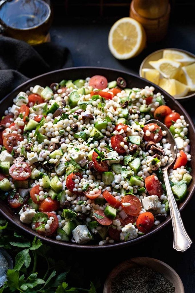 Pearl couscous salad served in a bowl.
