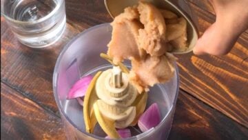 Fish roe (tarama) in a food chopper.