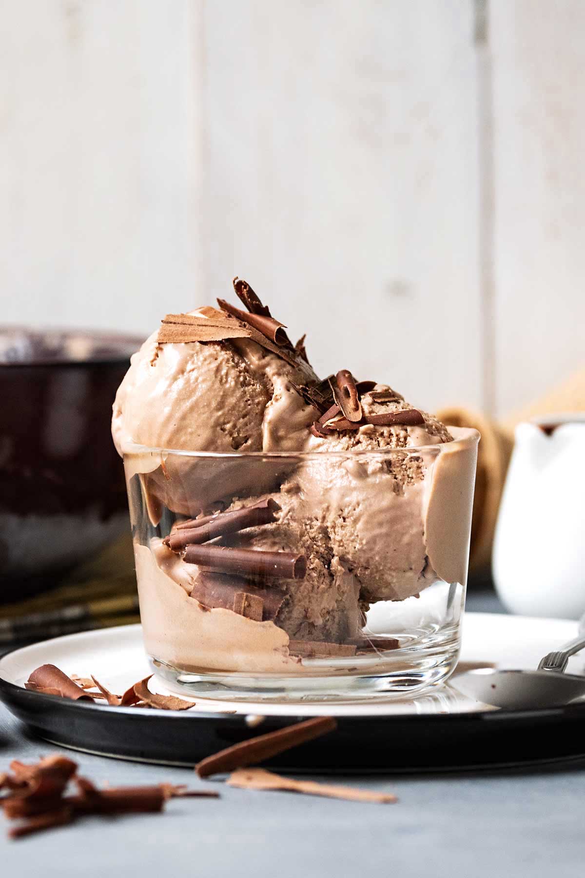 Mocha ice cream (coffee and chocolate flavor) served in a bowl with chocolate shavings.