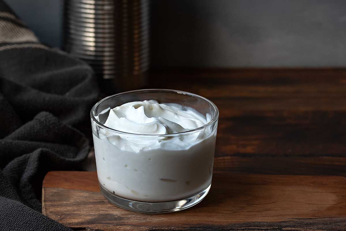 Image showing a bowl of coconut cream as a dairy-free Greek yogurt substitute.