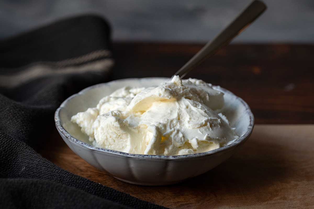 Image showing a bowl of cream cheese as a dairy Greek yogurt substitute.