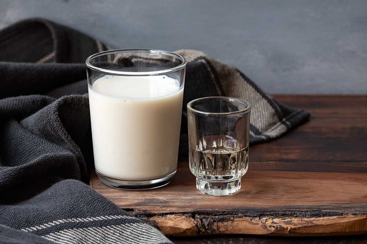 Image showing a glass of sour milk as a dairy Greek yogurt substitute.