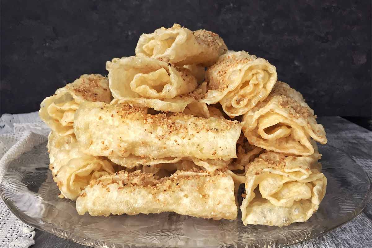 Diples drizzled with honey and nuts.