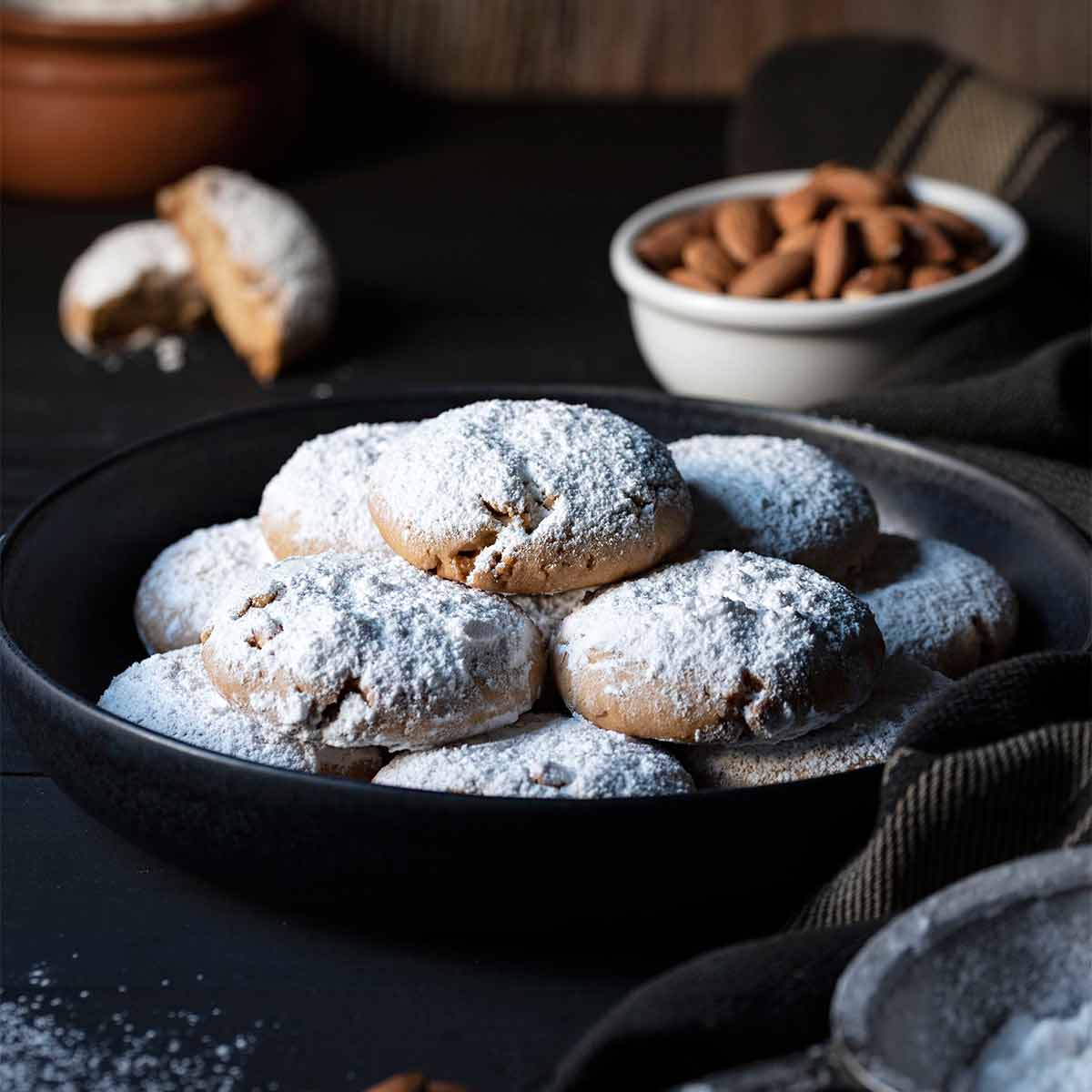 Kourabiedes (Greek butter cookies) on a plate.