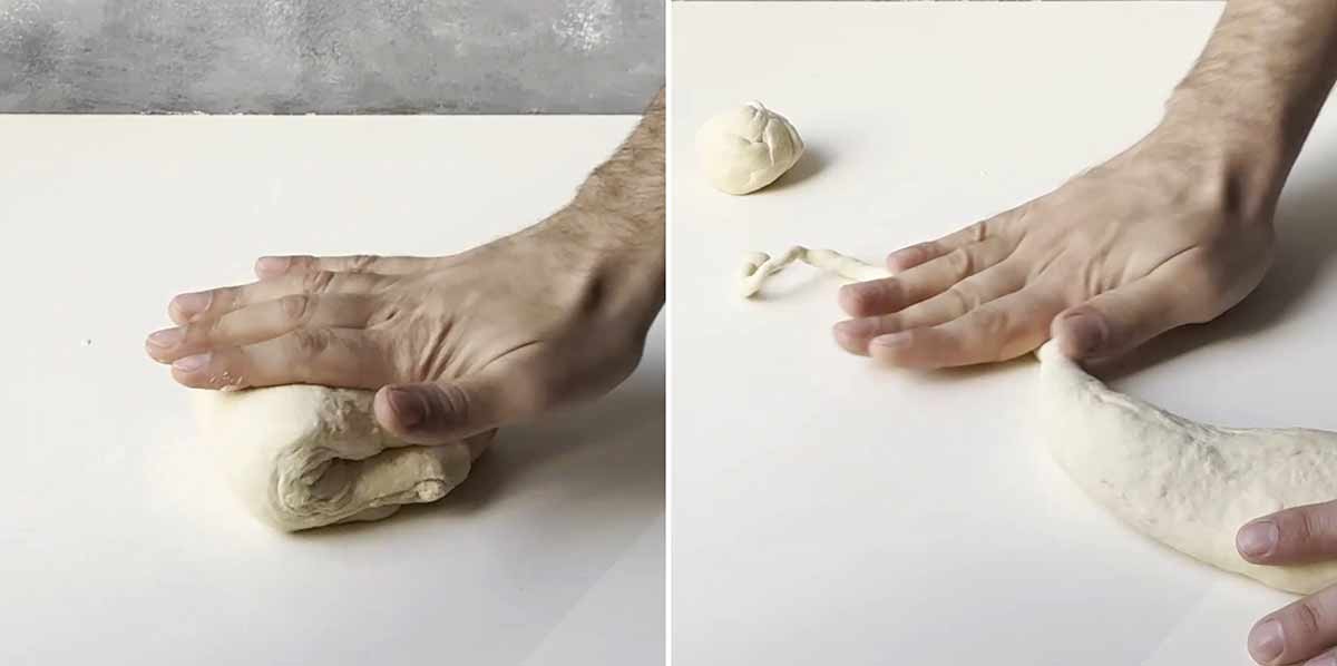 A hand kneading bread dough.