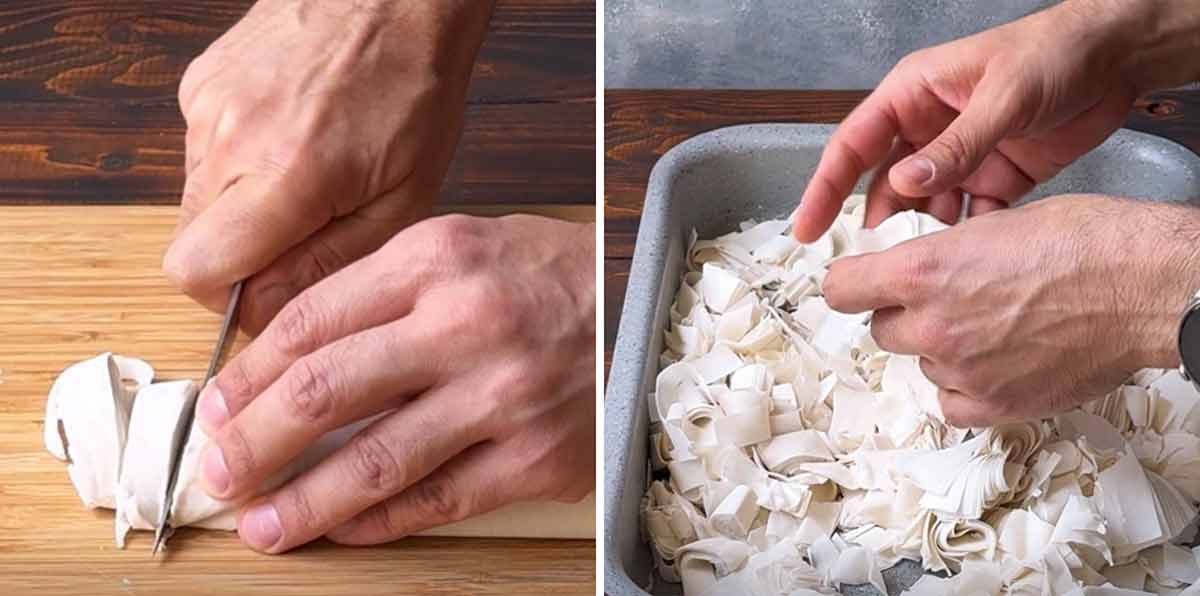 Two hands shredding the phyllo pastry.