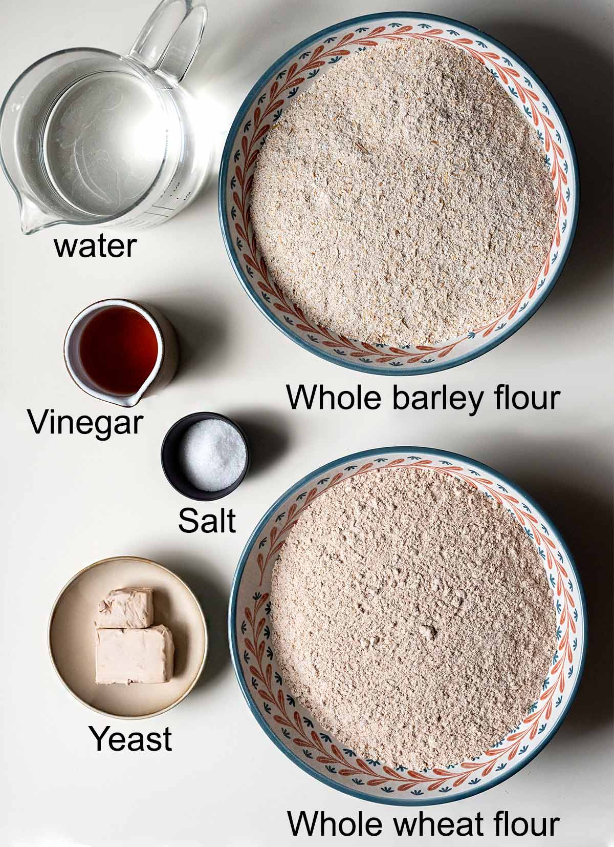 Ingredients for Greek barley rusks (Dakos).