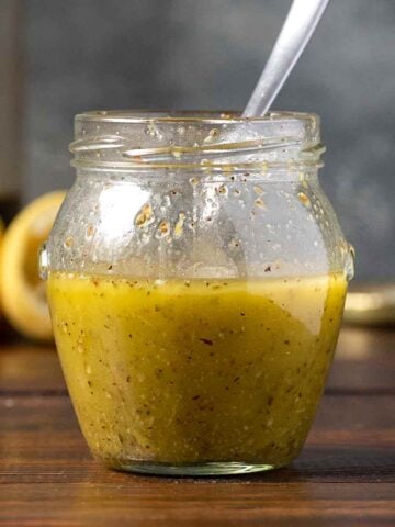 Ladolemono sauce in a jar.