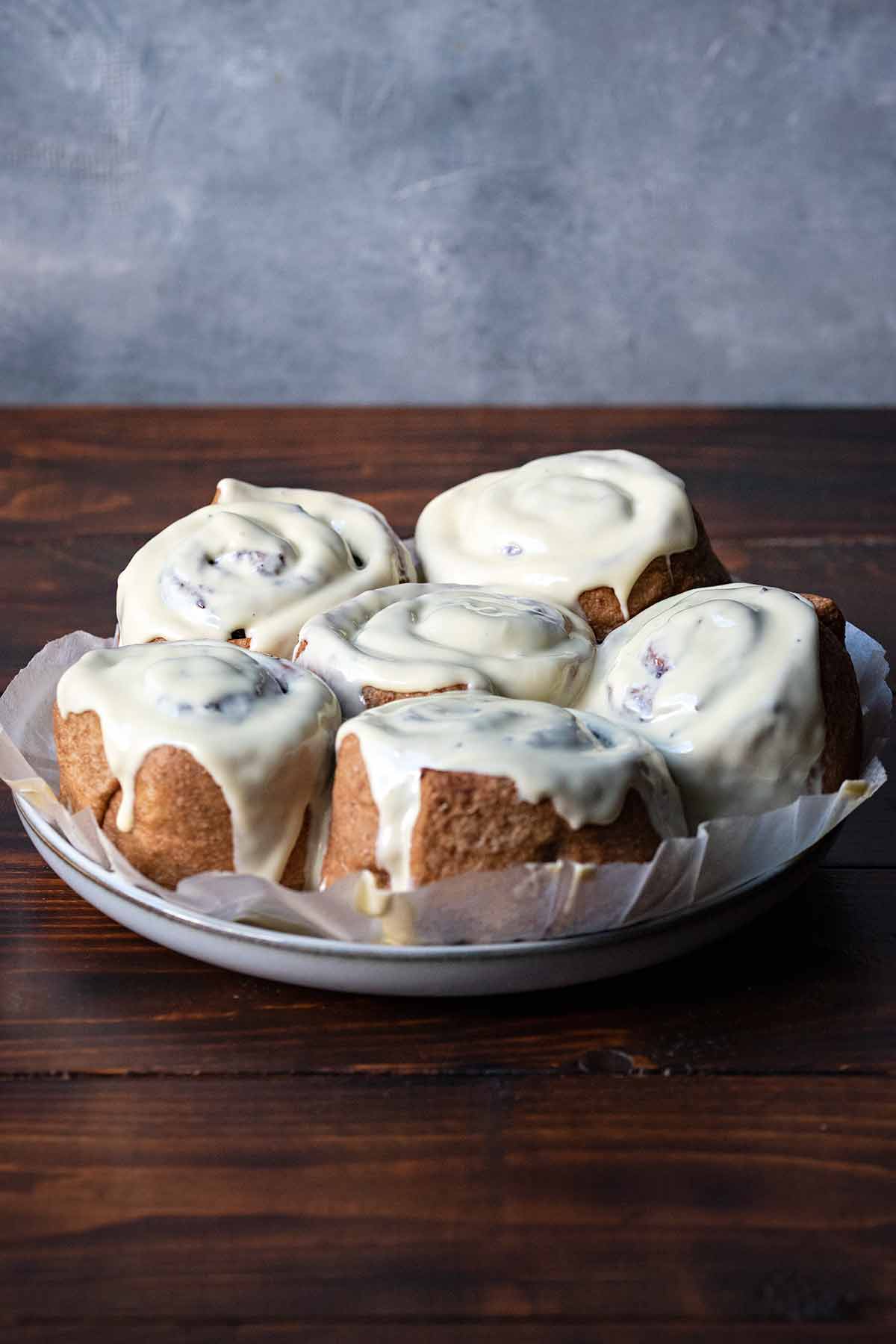 Healthy cinnamon rolls with white chocolate frosting.