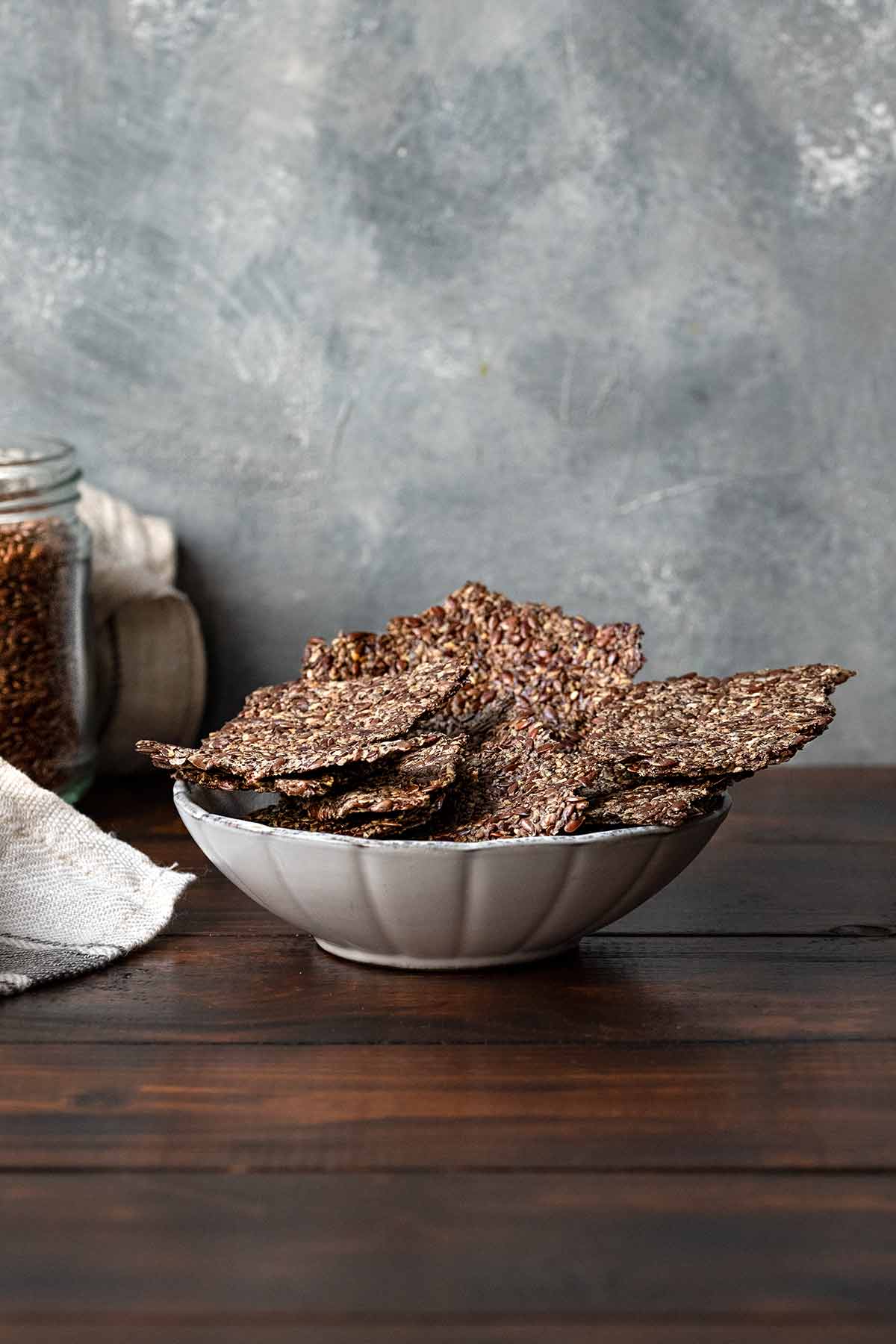 Flaxseed crackers in a serving bowl.