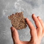 A square shaped flaxseed cracker.