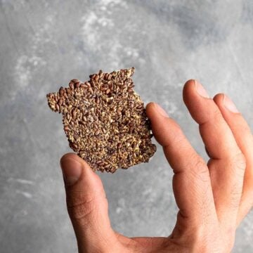 A square shaped flaxseed cracker.
