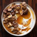 Greek yogurt with honey and walnuts featured.