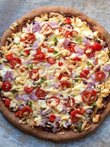 Greek yogurt pizza dough with whole wheat flour and baking powder.